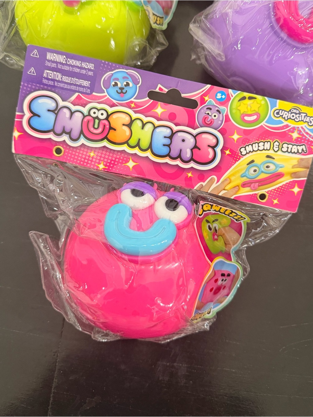 Smushers Plush Squeeze Toy - Bright Pink with Blue Face